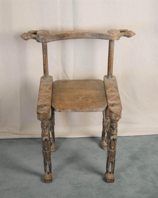 Appraisal: Carved Ethnic Chair African chair with four finely carved legs