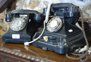 Appraisal: A vintage black executive telephone and extension telephone