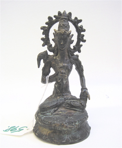 Appraisal: A SINO-TIBETAN PATINATED METAL DEITY seated in dhyanasana the left