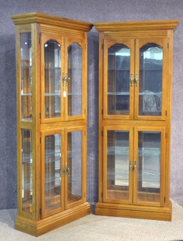 Appraisal: Pair of Oak Curio CabinetsMid th century Each having four