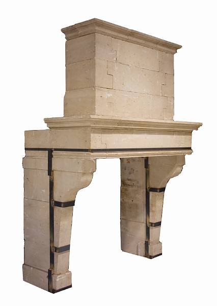 Appraisal: A French Baroque limestone fireplace surround primarily th th century