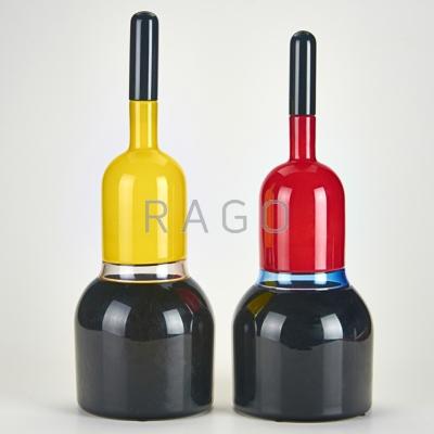 Appraisal: TIMO SARPANEVA VENINI Two cased glass bottles and stoppers with