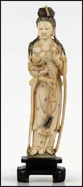 Appraisal: CHINESE CARVED IVORY FIGURE OF A QUAN YIN HOLDING FLOWERS