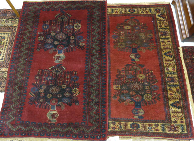 Appraisal: TWO SIMILAR HAND KNOTTED ORIENTAL AREA RUGS Afghani tribals each