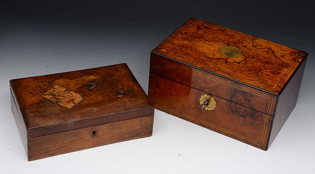 Appraisal: A VICTORIAN FIGURED WALNUT AND BRASS INLAID JEWEL BOX with