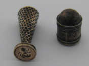 Appraisal: A silver cylindrical nutmeg grater with domed top and steel