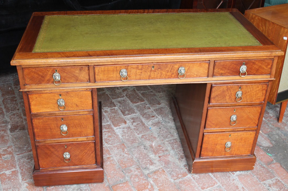 Appraisal: An early thC mahogany twin pedestal writing desk the moulded