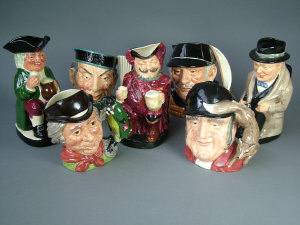 Appraisal: Seven Royal Doulton character jugs comprising 'The Mikado' D 'Gone