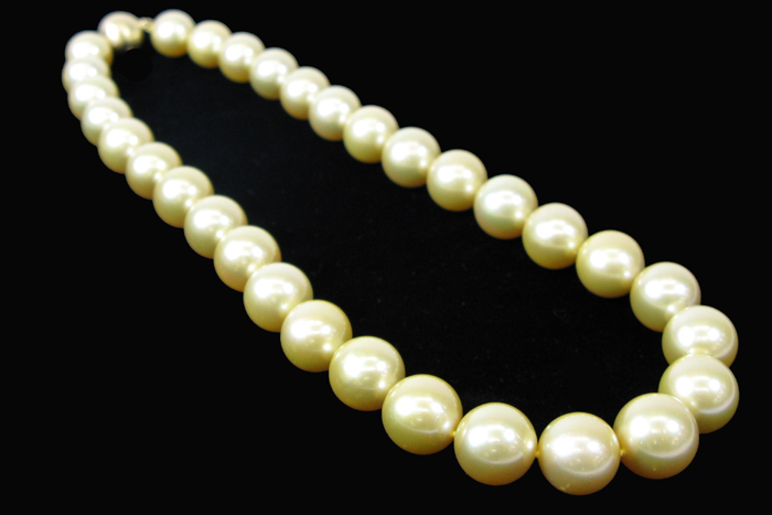 Appraisal: GOLDEN SOUTH SEA PEARL DIAMOND AND FOURTEEN KARAT GOLD NECKLACE