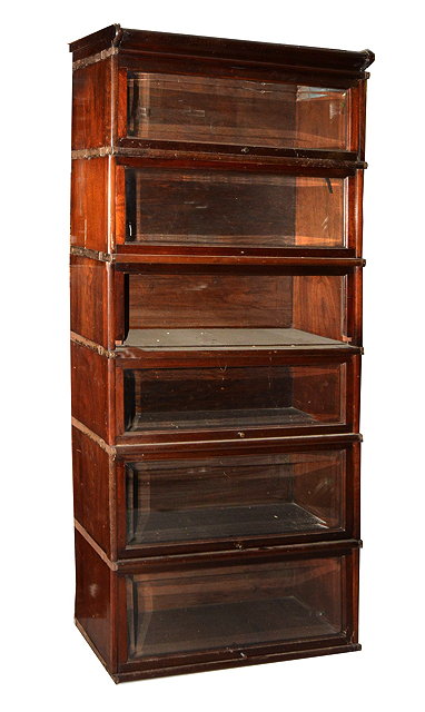 Appraisal: A GLOBE-WERNICKE SIX SECTIONAL BOOKCASE with bevelled glazed doors one