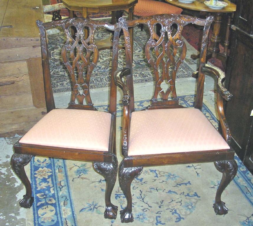 Appraisal: A set of eight reproduction mahogany Chippendale design dining chairs