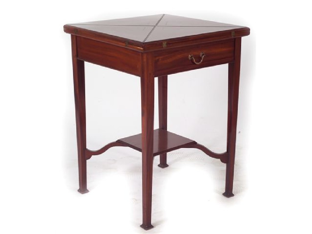 Appraisal: EDWARDIAN MAHOGANY HANDKERCHIEF GAMING TABLE the square top opening to