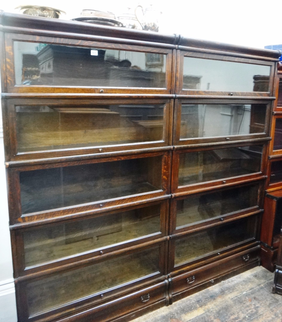 Appraisal: A pair of Globe Wernicke oak five tier bookcases with