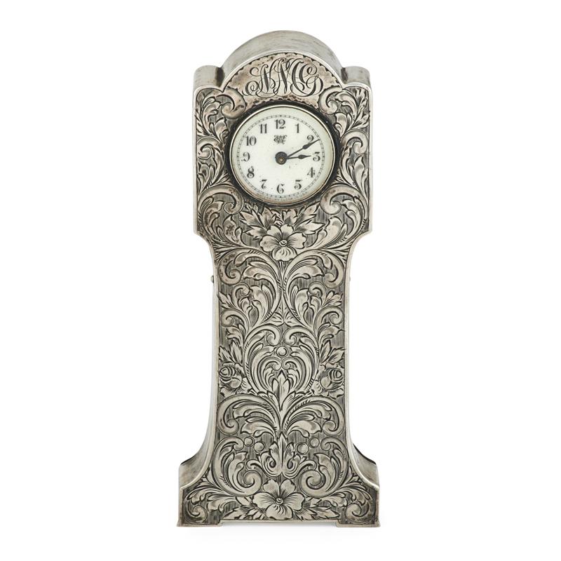 Appraisal: WATERBURY SILVER MOUNTED DRESSER CLOCK I N Deitsch engraved scroll