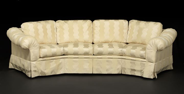 Appraisal: Contemporary Upholstered Sofa of canted form the back and seat