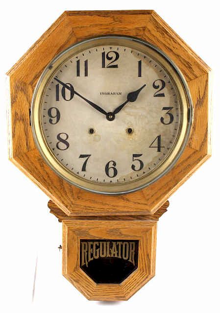 Appraisal: Ingraham Oak Drop Octagon Wall Clock c Offered in this