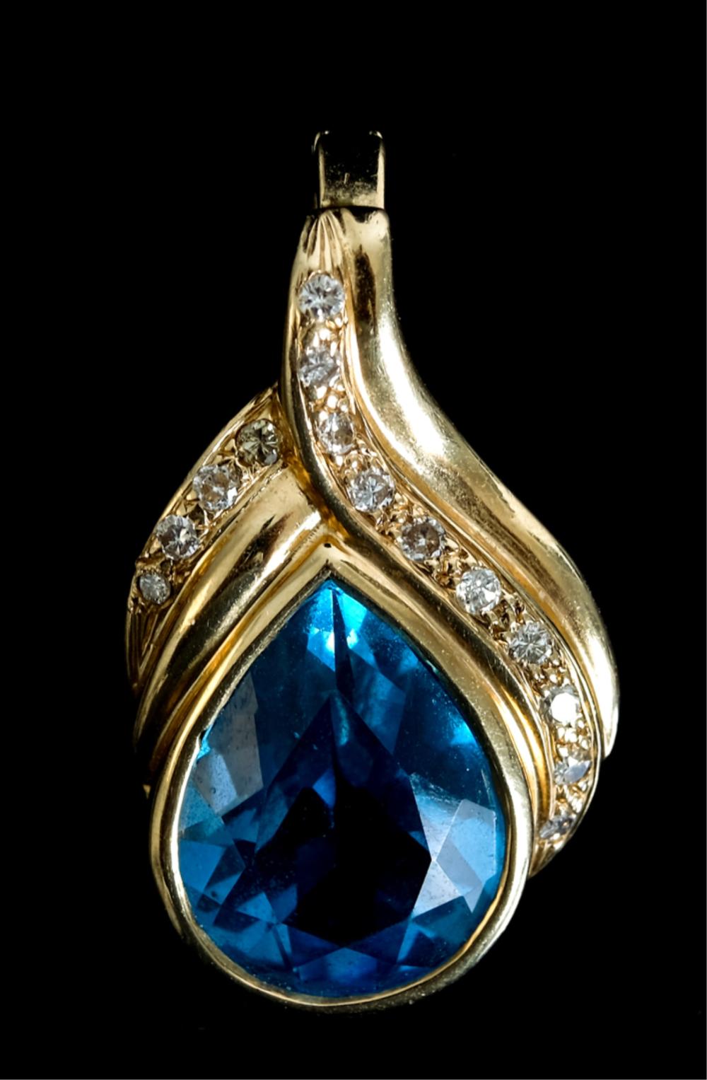 Appraisal: K YG CT BLUE TOPAZ DIAMOND PENDANT k yellow gold