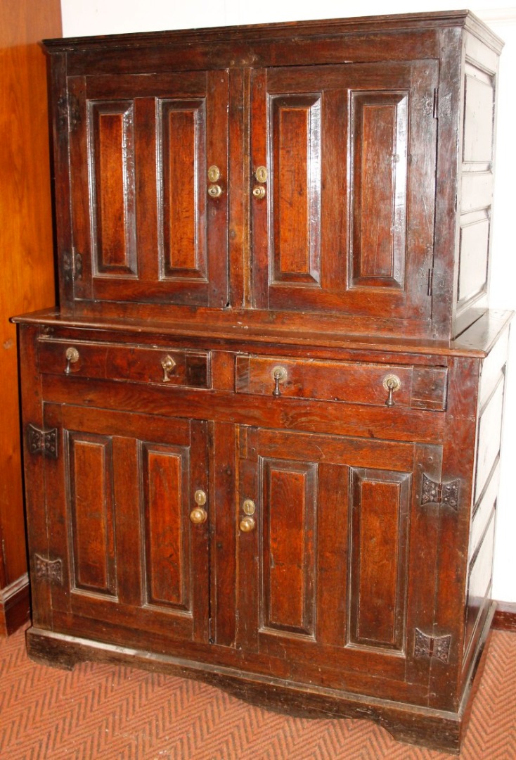 Appraisal: An oak press type cupboard the top with two panelled