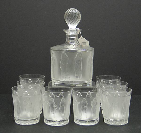 Appraisal: A Lalique frosted and clear glass decanter and eight glasses