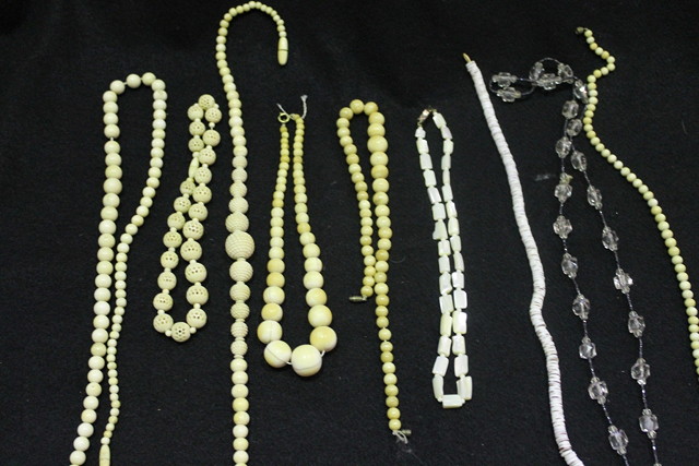 Appraisal: A COLLECTION OF VARIOUS IVORY BEAD NECKLACES including graduated examples