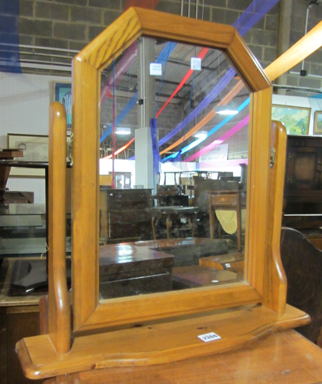 Appraisal: A pine dressing mirror and a cane tray stand