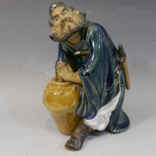 Appraisal: CHINESE SHIWAN POTTERY FIGURE OF A MAN NO RESERVE ON