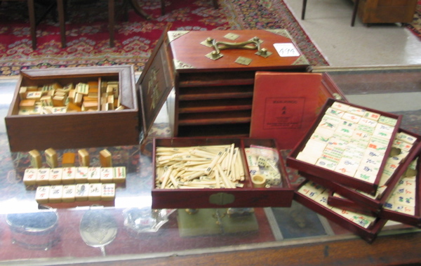 Appraisal: TWO ASIAN WOOD CASED MAHJONG SETS AND FOUR TRAYS One