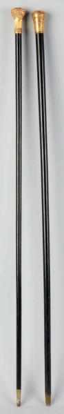 Appraisal: Lot of Walking Stick Canes With gold tops Condition Excellent