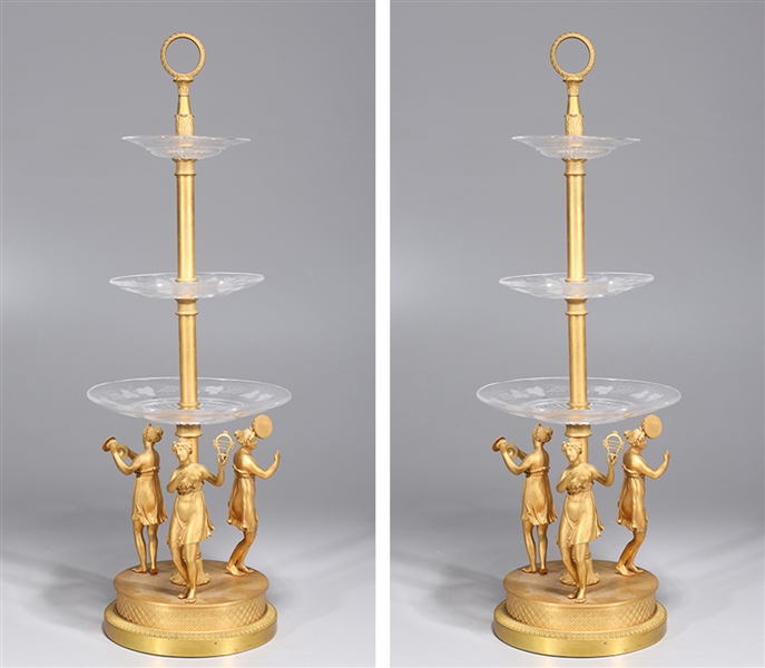 Appraisal: Pair of gilt metal three-tier stands each with three glass