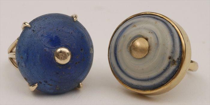 Appraisal: TWO GOLD RINGS SET WITH BLUE GLASS BEADS Both size