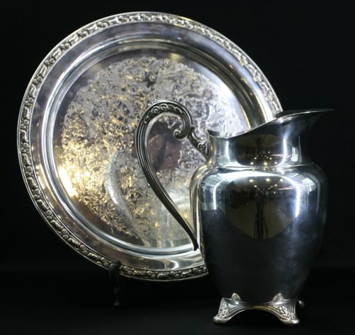 Appraisal: An Oneida silver water jug together with an Oneida silver