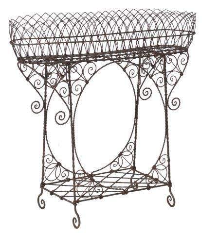 Appraisal: French wrought iron wirework jardiniere th c having black frame