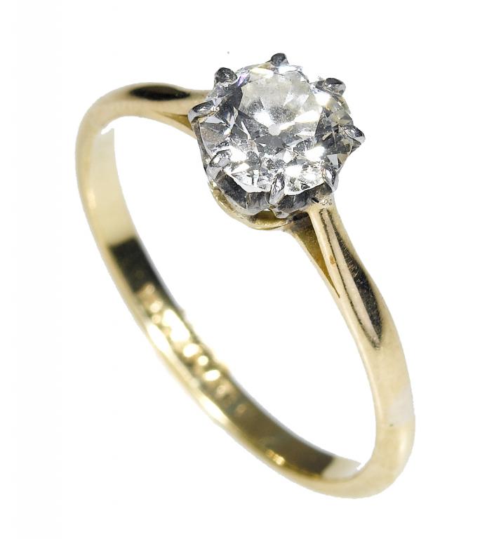 Appraisal: A DIAMOND SOLITAIRE RING with a round brilliant weighing approximately