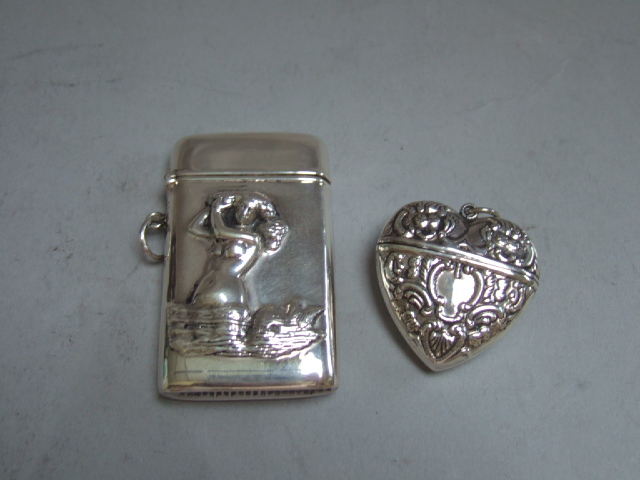 Appraisal: A rectangular vesta case decorated with a mermaid detailed and