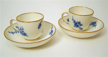 Appraisal: A pair of Sevres tea cups and saucers each decorated