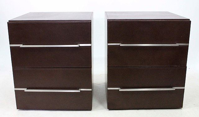 Appraisal: A PAIR OF BROWN FAUX LEATHER TWO DRAWER FILING CABINETS