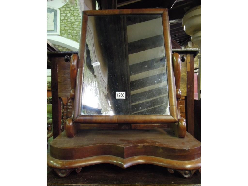 Appraisal: A Victorian mahogany toilet mirror with rectangular mirror plate raised