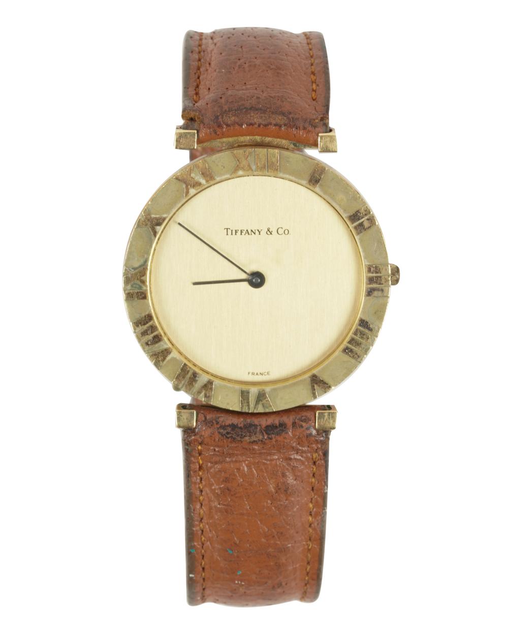 Appraisal: TIFFANY CO 'ATLAS' WATCHgold-plate with leather strap signed 'Tiffany Co