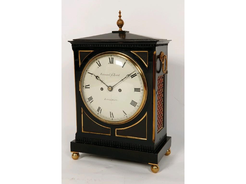 Appraisal: A GEORGE III EBONISED AND BRASS MOUNTED BRACKET CLOCK the