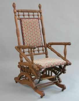 Appraisal: Victorian Oak Glider Rocking Chair Late th Century Victorian oak