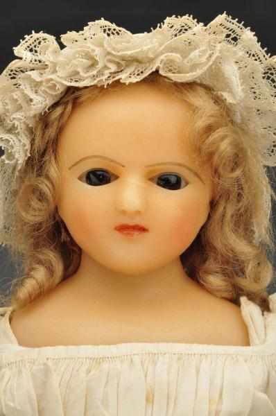 Appraisal: Early Wax Doll Description With wired eye mechanism Wax shoulder