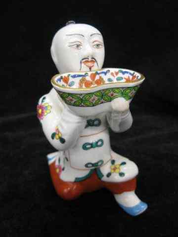 Appraisal: Herend Porcelain Figurine of a ChineseBoy holding a basket probably