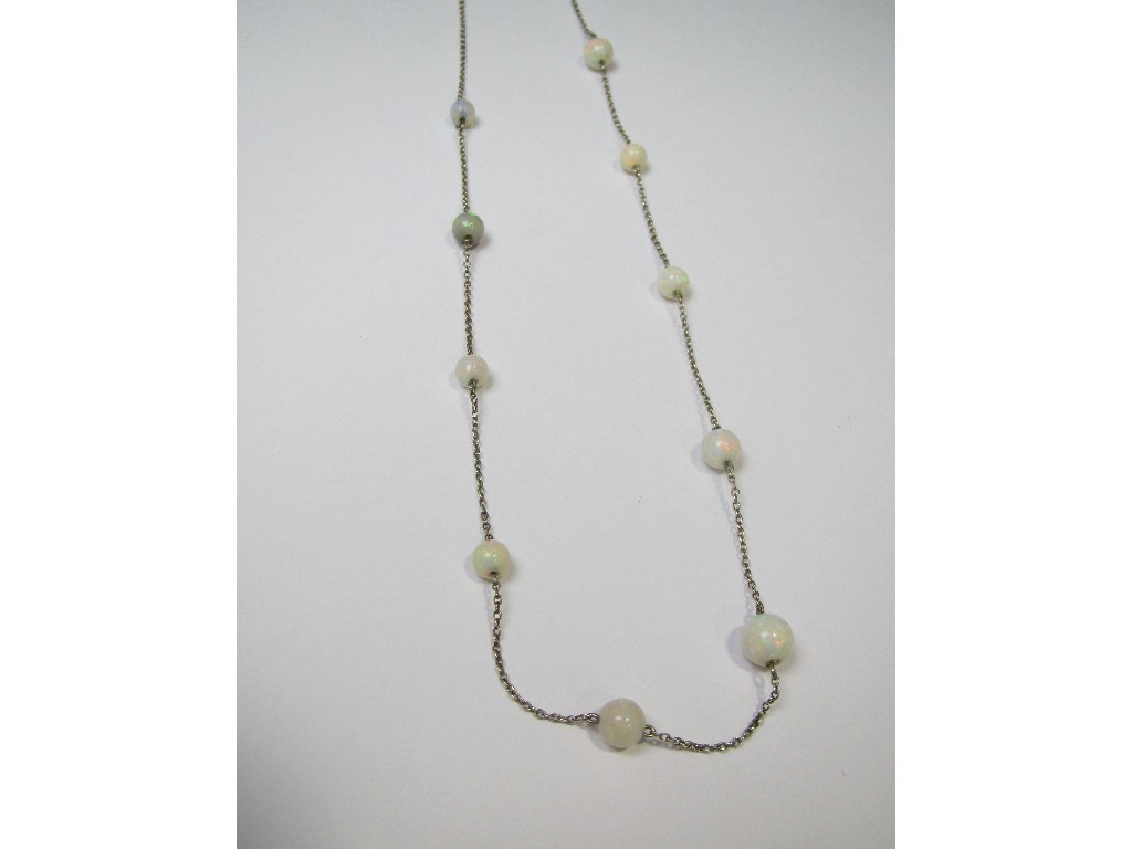 Appraisal: White metal neckchain with opal bead spacers Approximately inches