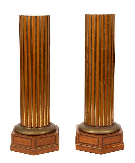 Appraisal: A Pair of Walnut and Parcel Gilt Fluted Pedestals Height