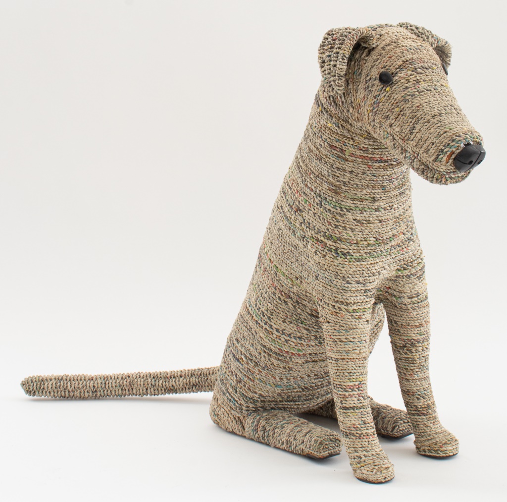 Appraisal: MAN'S BEST FRIEND CANINE TWINE SCULPTURE Artist Unknown Man's Best