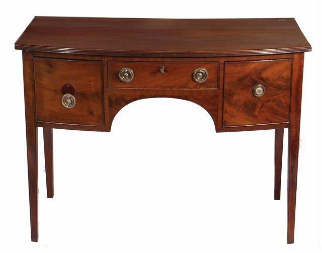 Appraisal: A LATE GEORGE III BOW FRONTED MAHOGANY SIDE TABLE the