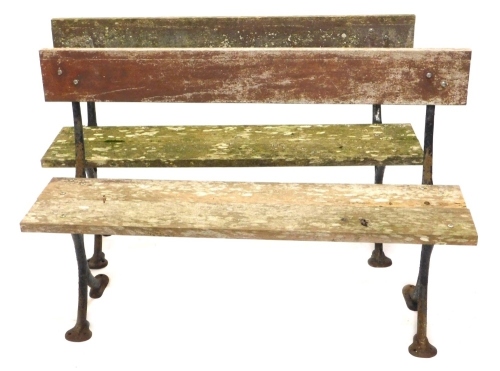 Appraisal: A matched pair of cast iron and wooden slatted railway