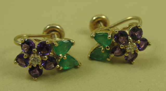 Appraisal: PAIR OF EMERALD AND AMETHYST EARRINGS each k yellow gold