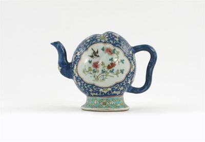 Appraisal: A Chinese Cadogan teapot decorated with two panels containing vases