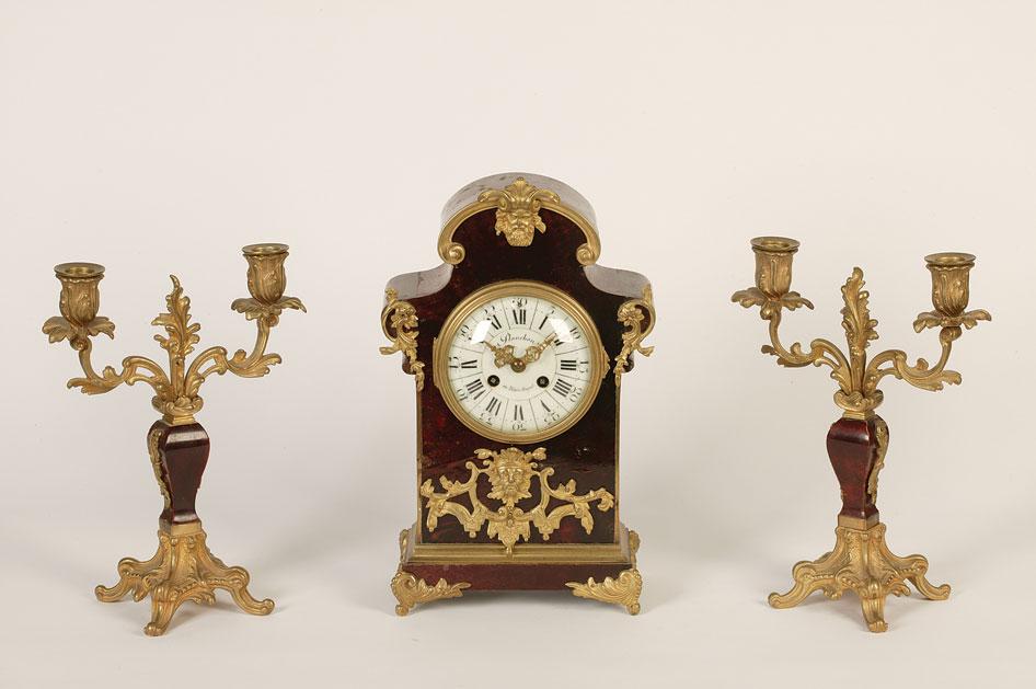 Appraisal: A TH CENTURY FRENCH TORTOISESHELL VENEERED AND GILT METAL CLOCK